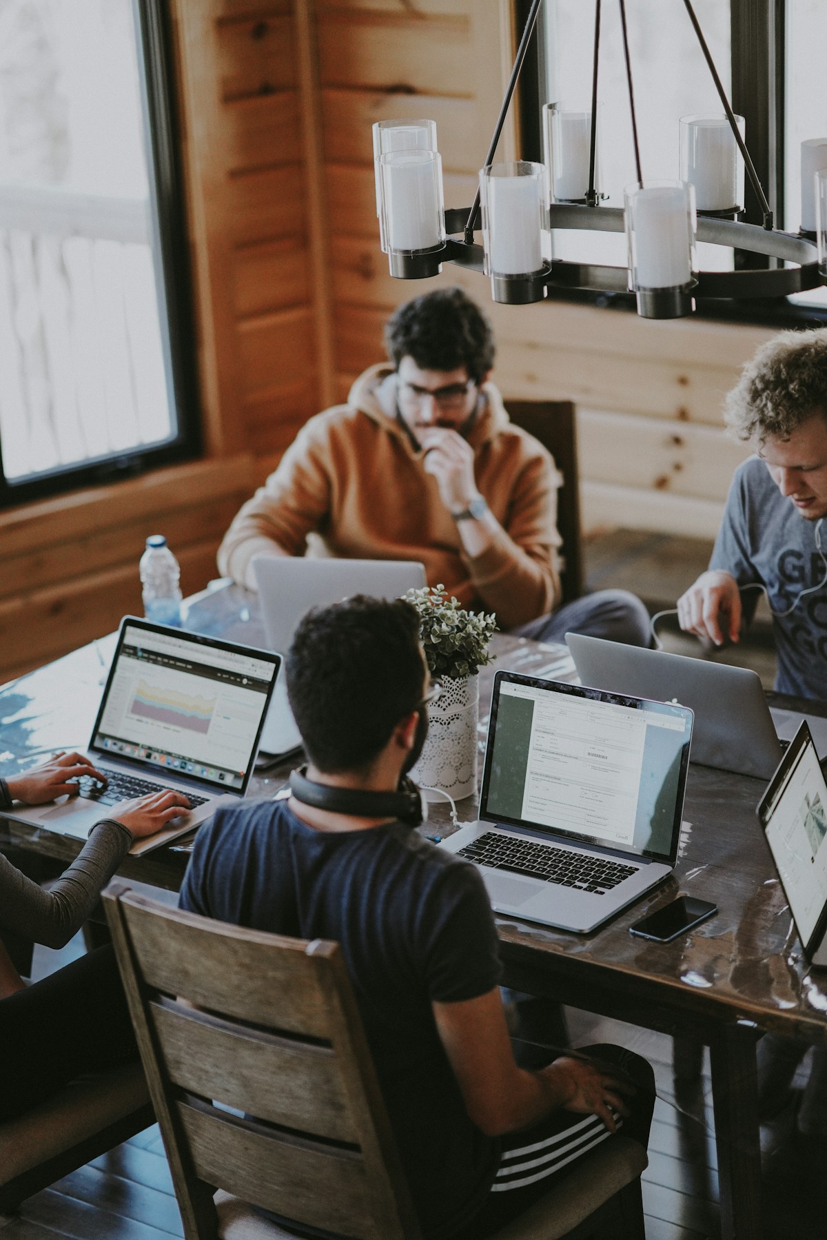 Business partners meeting around a conference table
